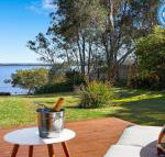 Braeside waterfront fireplace - Tourism Gold Coast