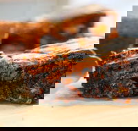 Small Axe - Tourism Gold Coast