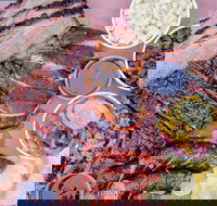 Bovine and Swine Barbeque - Tourism Gold Coast