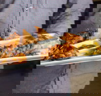 The Snake Charmer - Tourism Gold Coast