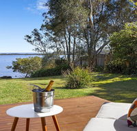 Braeside - waterfront fireplace - Tourism Gold Coast