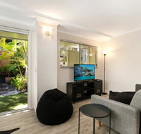 Tropical Townhouse With Two Courtyards and Pool - Tourism Gold Coast