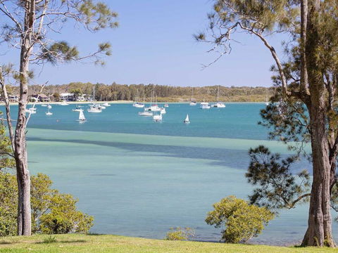 'Corlette Waterfront', 2/44 Danalene Parade - Waterfront Luxury, WIFI, Aircon, Boat Parking - Tourism Gold Coast 0
