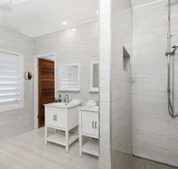 Bathers across the bay from Port Douglas - Tourism Gold Coast